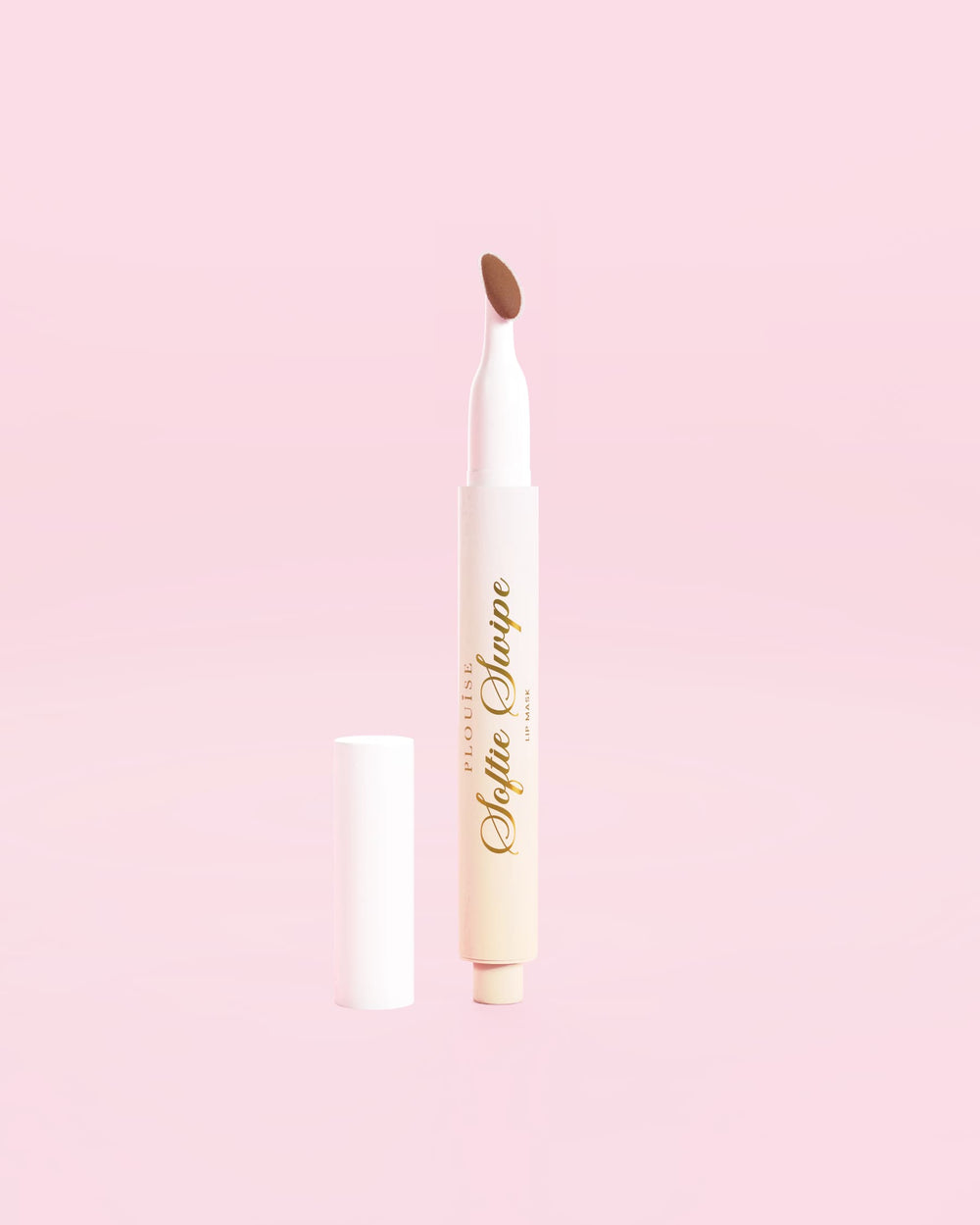 An image of a P.Louise Softie Swipe Tinted Lip Mask in Soft Launch against a pink background