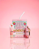 P.Louise Strawberry Baby Bad B Mini Lip Oil & Mini Lip CONditioner บนพื้นหลังสีชมพู
