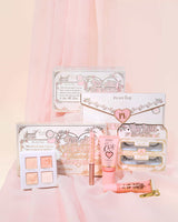 เซตแต่งหน้าเจ้าสาว P.Louise You're Cordially Invitationd มาพร้อมแพ็คเกจสีชมพูขาวบนพื้นหลังสีชมพูอ่อน