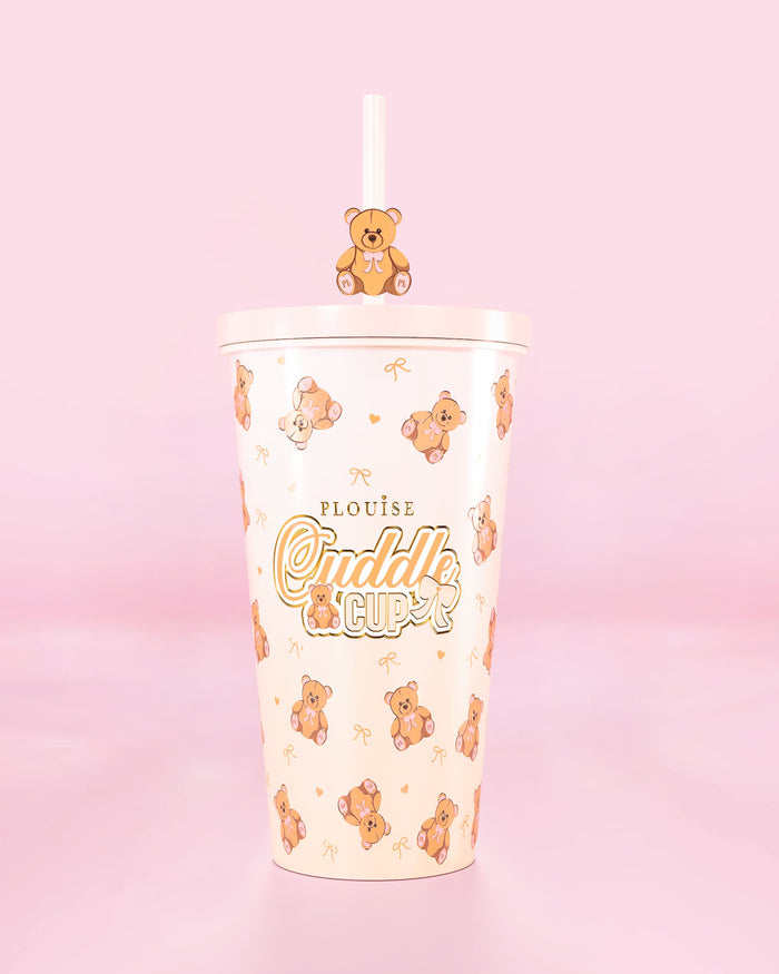 ถ้วยแก้วน้ำเหล็กพร้อมหลอด ดีไซน์ตุ๊กตาหมี พร้อมข้อความ 'Cuddle Cup' บนพื้นหลังสีชมพู
